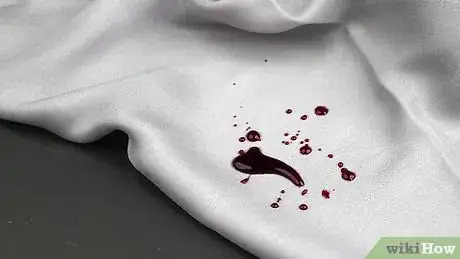 Image titled Remove Blood from Satin Sheets Step 1