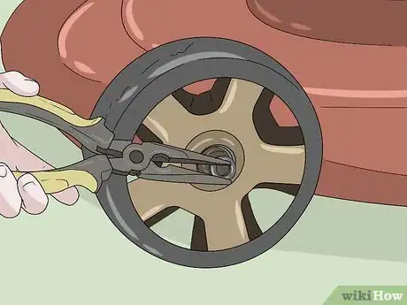 Image titled Remove a Lawn Mower Wheel Step 5