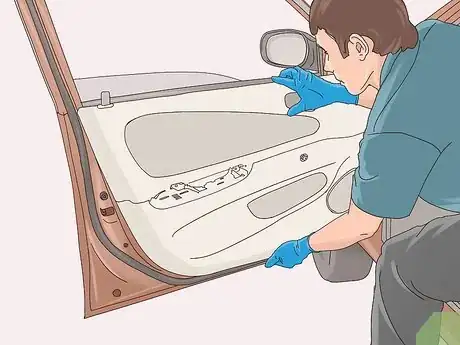 Image titled Remove a Door Panel from a Car Step 11