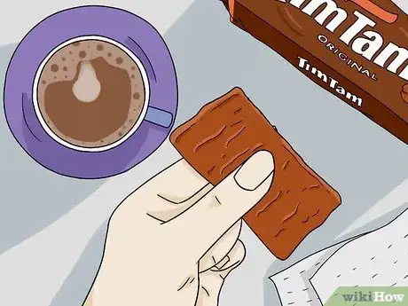 Image titled Do the Tim Tam Slam Step 3