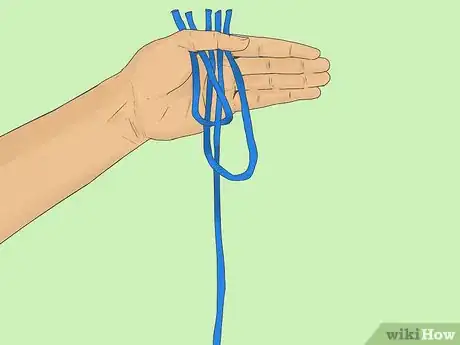 Image titled Perform the Three Equal Ropes Illusion Step 6