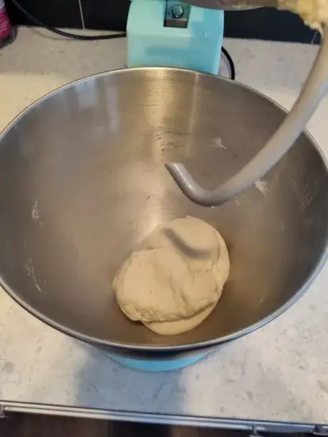 Image titled Step 3 let the mixer kneed the dough