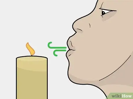 Image titled Extinguish a Candle Step 2