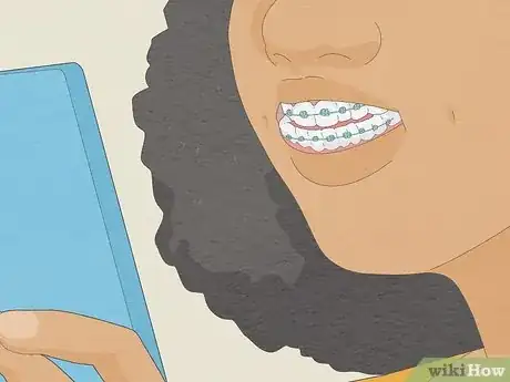 Image titled Brush Your Teeth With Braces On Step 5