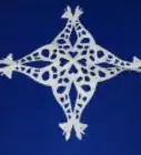 Cut Elegant Paper Snowflakes