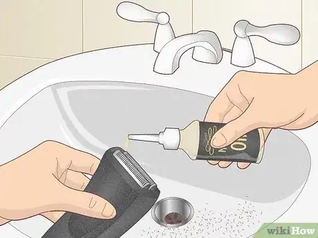 Image titled Apply Oil to an Electric Shaver Step 7