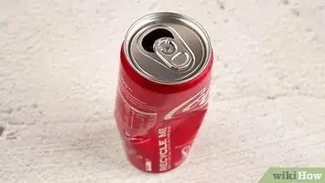 Image titled Do the Soda Can Magic Trick Step 4