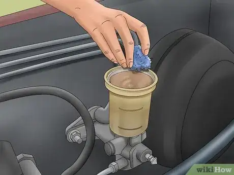 Image titled Add Brake Fluid to the Clutch Master Cylinder Step 7