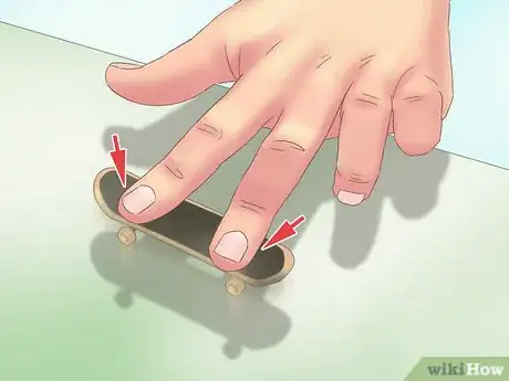 Image titled Kickflip on a Tech Deck Step 7