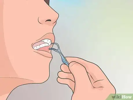 Image titled Pick Your Teeth Without a Toothpick Step 2