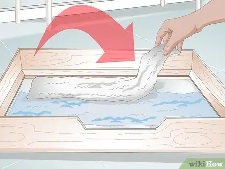 Image titled Keep a Whelping Box Clean Step 10