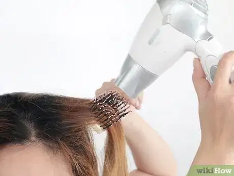 Image titled Blow Dry Curly Hair Straight Step 10