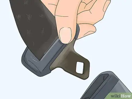 Image titled Open a Seat Belt Buckle Cover Step 1