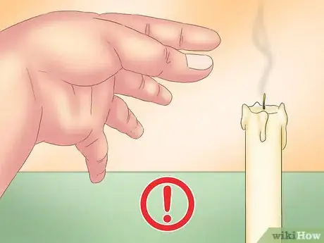 Image titled Put Out a Candle with Your Fingers Step 5