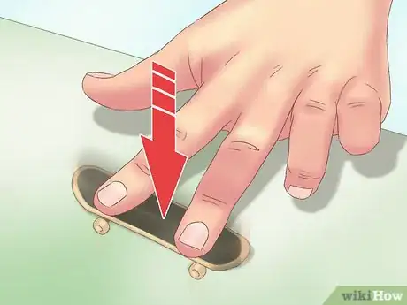 Image titled Kickflip on a Tech Deck Step 8