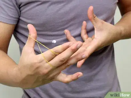 Image titled Make and Shoot Mini Paper Bullets with Rubber Bands Step 19