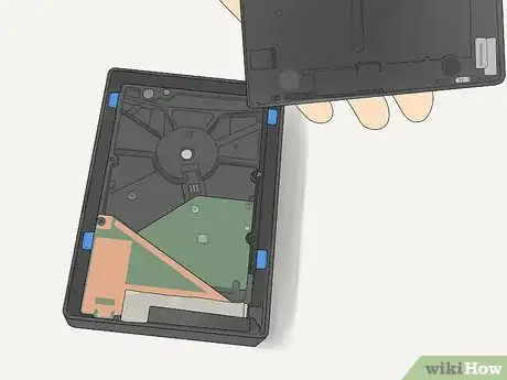 Image titled Open a Seagate External Hard Drive Step 2