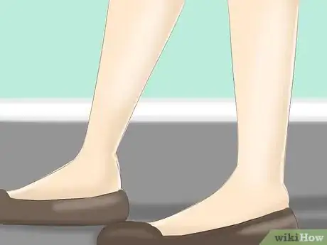 Image titled Keep Feet from Falling Asleep Step 1