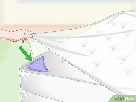 Image titled Prevent Sheets from Slipping Off a Bed Step 11