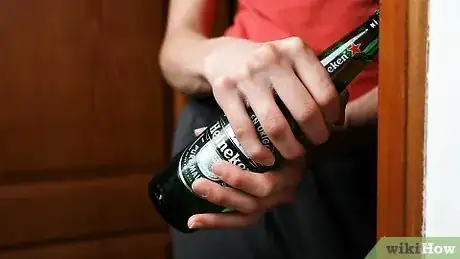 Image titled Open a Beer Bottle with a Key Step 11