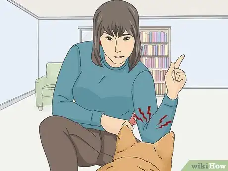 Image titled Get a Puppy to Stop Growling when You Pick Them Up Step 4