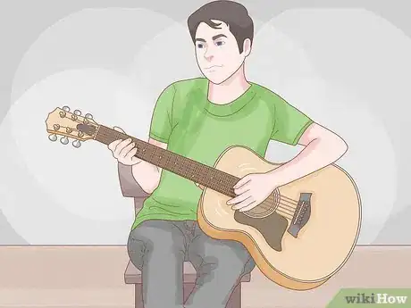 Image titled Ease Finger Soreness when Learning to Play Guitar Step 1