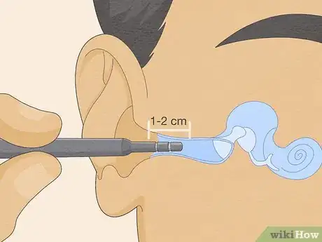 Image titled Look Into Your Own Ear Step 3