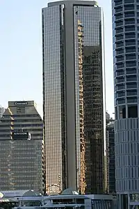 AMP Place. Brisbane.  Completed in 1977.  An early example of late modern curtain walled mirror glass skyscraper.