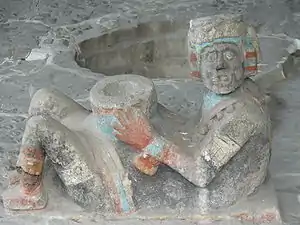 Underground  Great Temple's Chacmool statue; 1440–1469; painted earthenware; length: 1.26&nbsp;m (4.1&nbsp;ft); Templo Mayor (Mexico City)