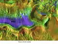 Hebes Chasma, as seen by THEMIS.  Reddish areas are rockier.