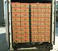 Transport of banana boxes in refrigerated containers at 13.5° C (2006).