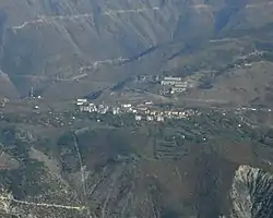 Krastë seen from the summit of Noi i Madh (1848 m), at a distance of 7.7&nbsp;km (5&nbsp;mi) as the crow flies.