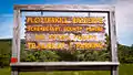 Sign in the Parking Lot of the Copland Road entrance.