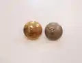 ROC metal tunic buttons, (Gilt Officer's button 3&nbsp;mm larger in diameter), depicting the Elizabethan coast watcher emblem.