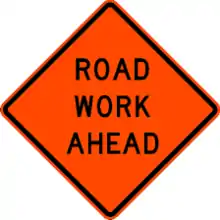 Image 35An orange diamond sign for upcoming roadworks. The worded legend shown here is banned by the 1968 Vienna Convention on Road Signs and Signals, but is allowed in the 2009 Manual on Uniform Traffic Control Devices. (from Roadworks)