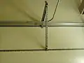 A shelf supporting electrical conduit and pipe, manufactured from strut channel