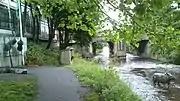 The river with in-flow sculpture