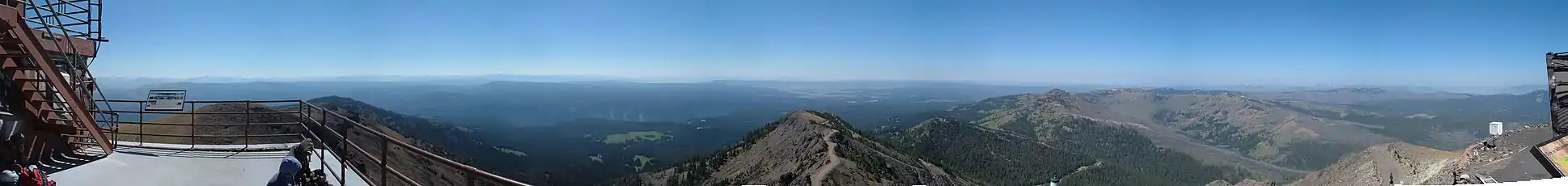 Panorama taken from the fire lookout tower on the summit of Mt. Washburn. The center of the image looks south towards the Teton Range.