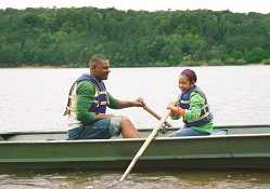 man and daughter in boat