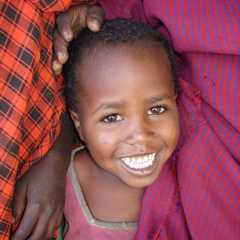 Child Smiling - Photo: David Snyder Child Smiling - Photo: David Snyder
