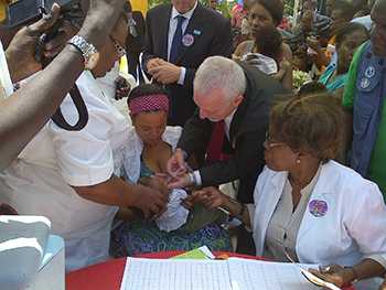 Launch of rotavirus vaccine program with government officials.