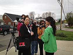 Joy Hsu, MD, (EIS 13) communicating with media during a field investigation of the public health effects of a chemical release in West Virginia