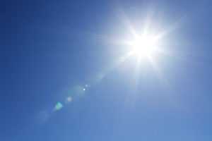 Image of sun in blue sky