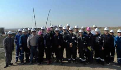Members of the 2016 US-EU Hydraulic Fracturing Safety Tour at an active hydraulic fracturing site in North Dakota.