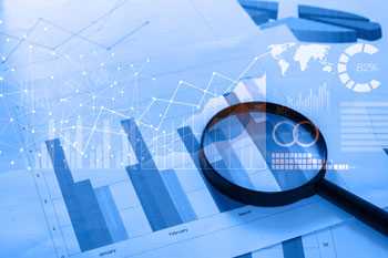 Charts, graphs, magnifying glass