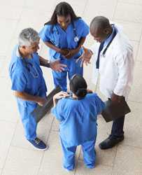Medical staff discussing issues.